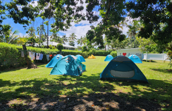 camping ground with blue tents at Arnott's Lodge