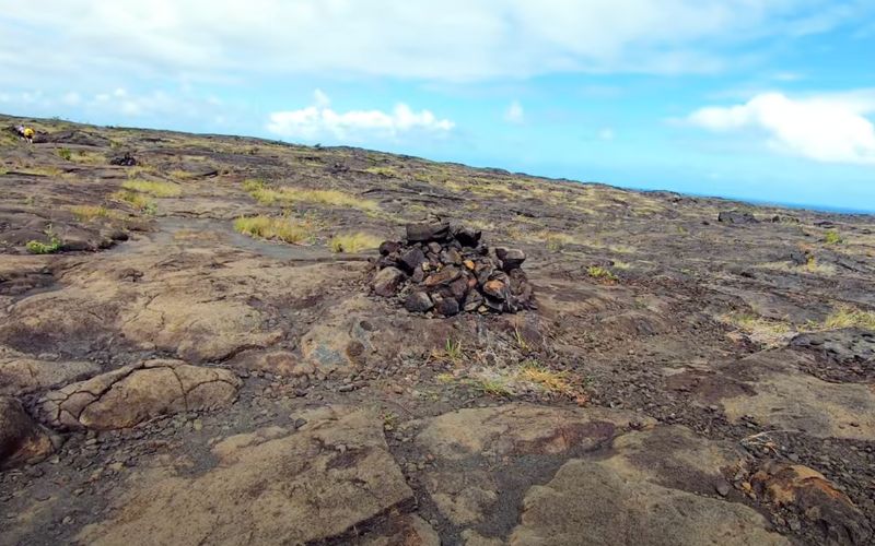 blue ocean behind a Lava field